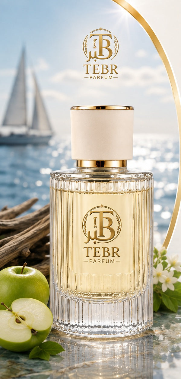 TEBR VOY eau de parfum bottle on a shoreline with a sailboat behind
